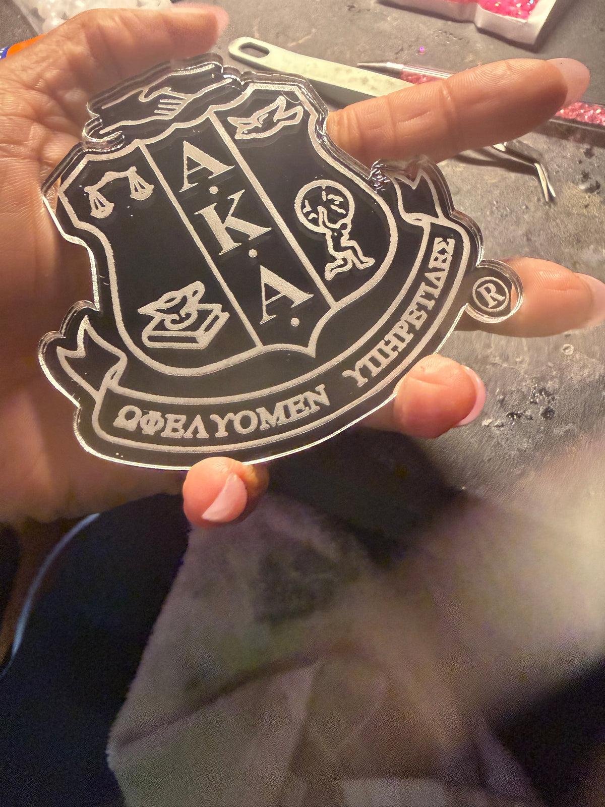 The Fully Engraved AKA® Shield Acrylic Pin ™